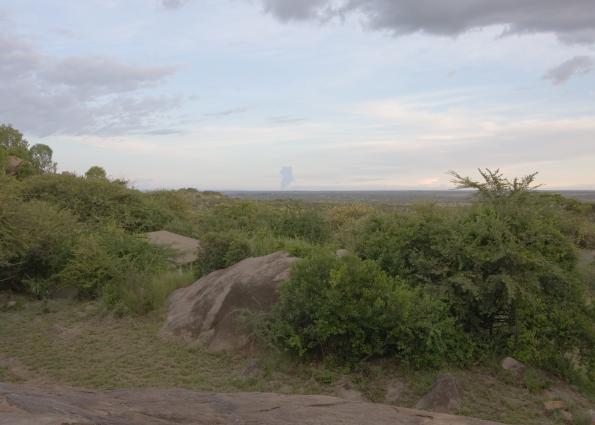 Serengeti-8186.jpg - View from the reception area/bar/lounge.  The volcano was spewing ash (visible in the distance) most of the days we were on safari.