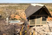 It is the last chalet on the ridge with a view of the waterhole