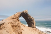 Jim a tiny speck climbing the Arch