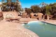 The pool area looks straight out of the Flintstones