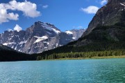 East Glacier peaks from a boat on the lake...