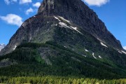 East Glacier peaks from a boat on the lake...