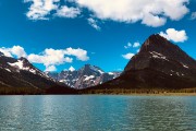 East Glacier peaks from a boat on the lake...