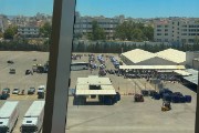 The embarkation staging area got hot and busy before everyone was aboard.