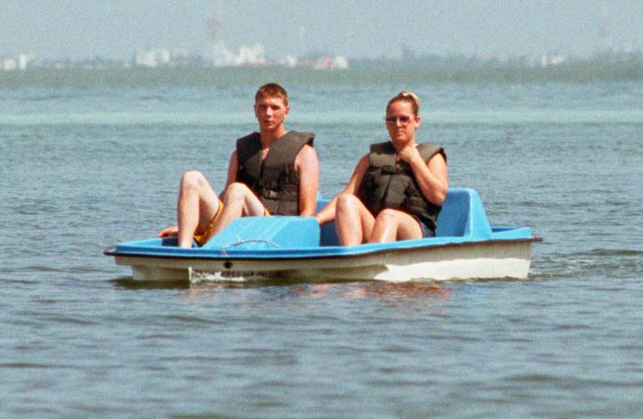 cancun4-6.jpg - Scott and Emily in their paddle boat