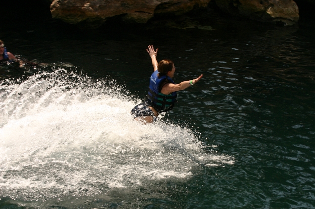 IMG_5525.JPG - Riding Dolphins -one on each foot (Xcaret theme park)